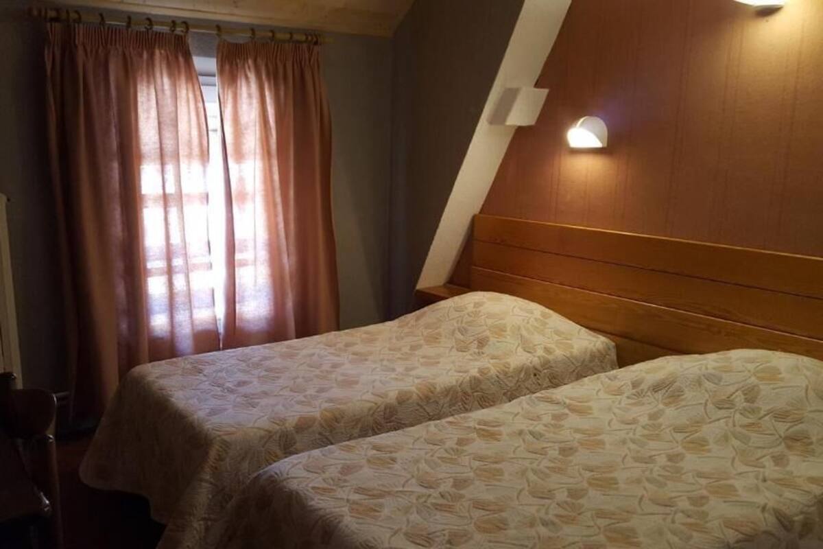 Quarto duplo clássico, vista para o pátio | Cortinas blackout, Wi-Fi de cortesia