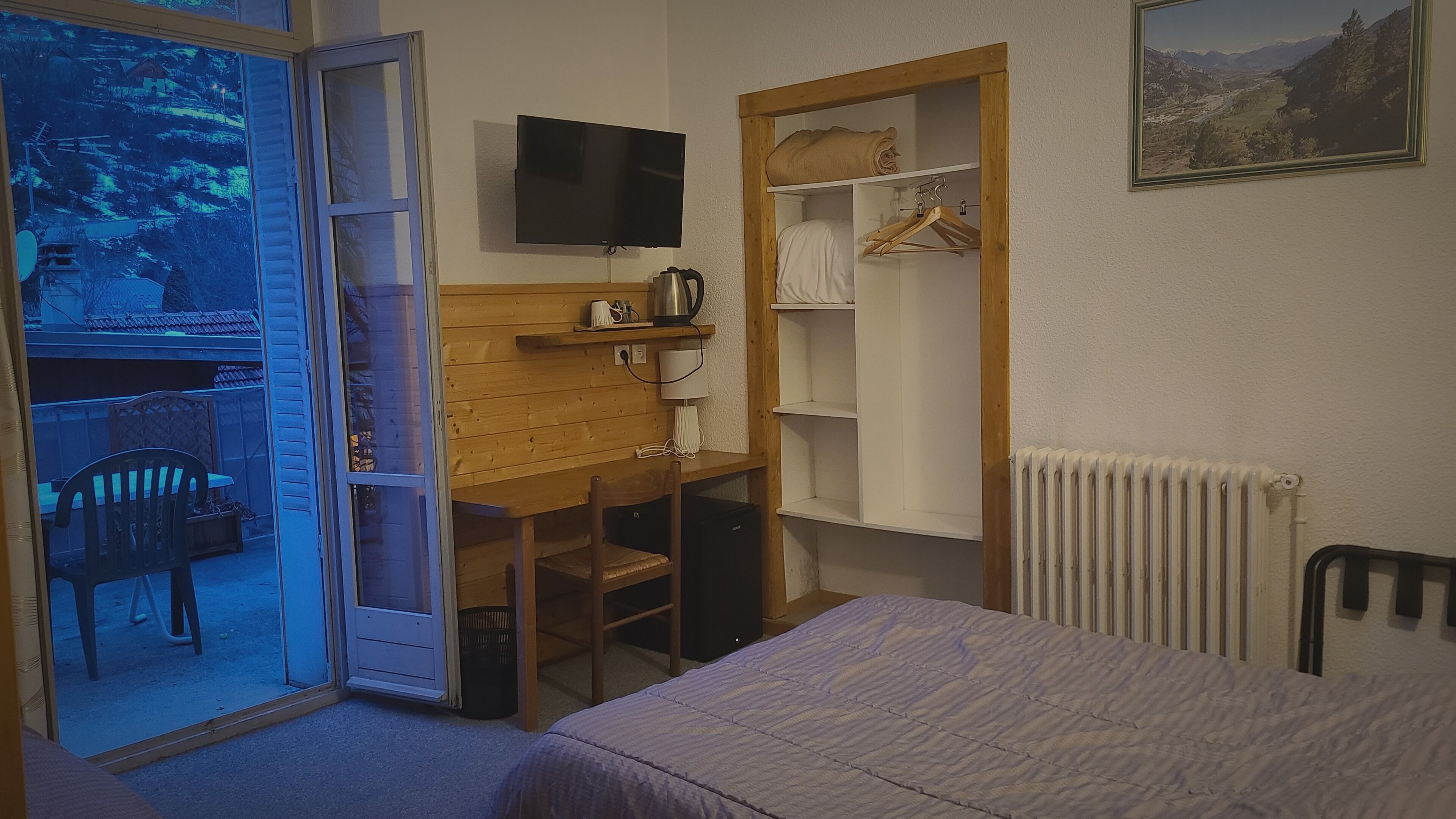 Quarto quádruplo conforto, vista para a montanha | Cortinas blackout, Wi-Fi de cortesia