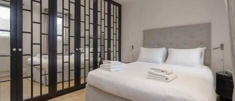 1 bedroom, premium bedding, laptop workspace, free wired Internet
