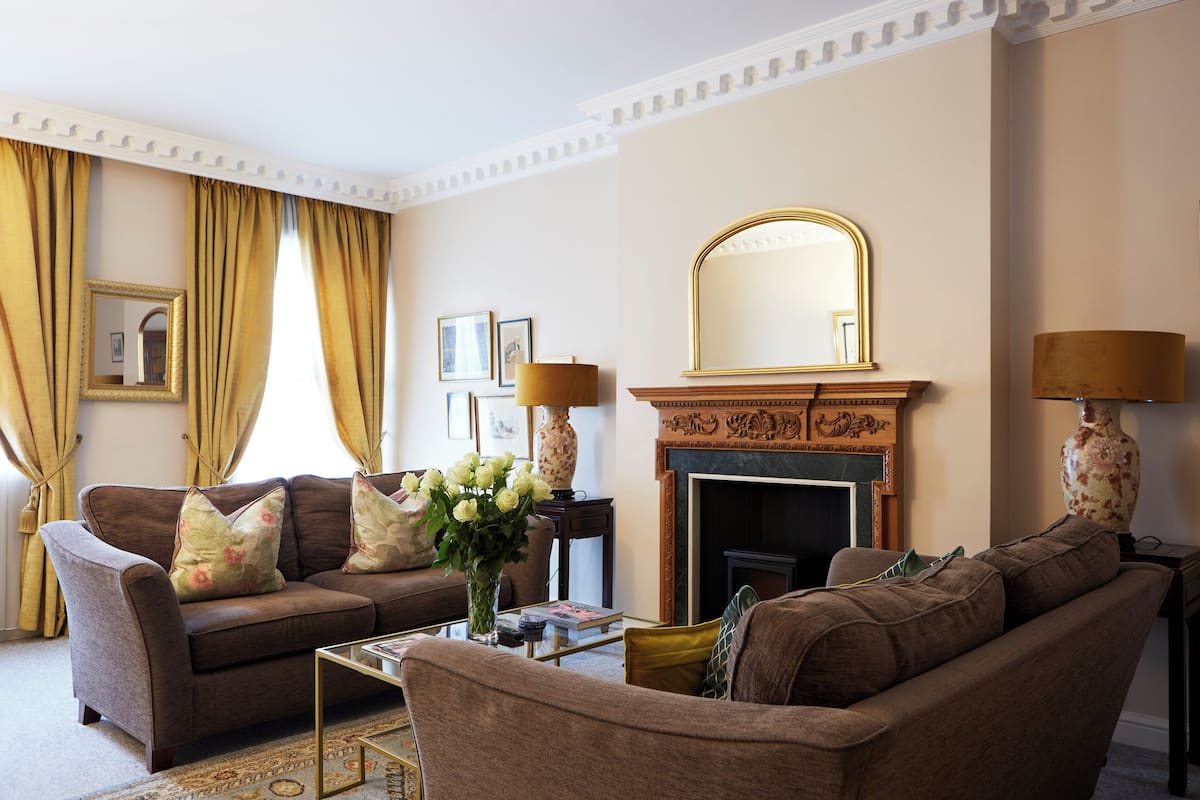 Classic Apartment, 1 Bedroom, City View | Living area | 55-inch Smart TV with digital channels, TV, fireplace