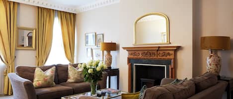 Classic Apartment, 1 Bedroom, City View | Living area | 55-inch Smart TV with digital channels, TV, fireplace