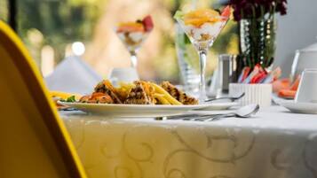 Breakfast, lunch, dinner served; African cuisine, pool views