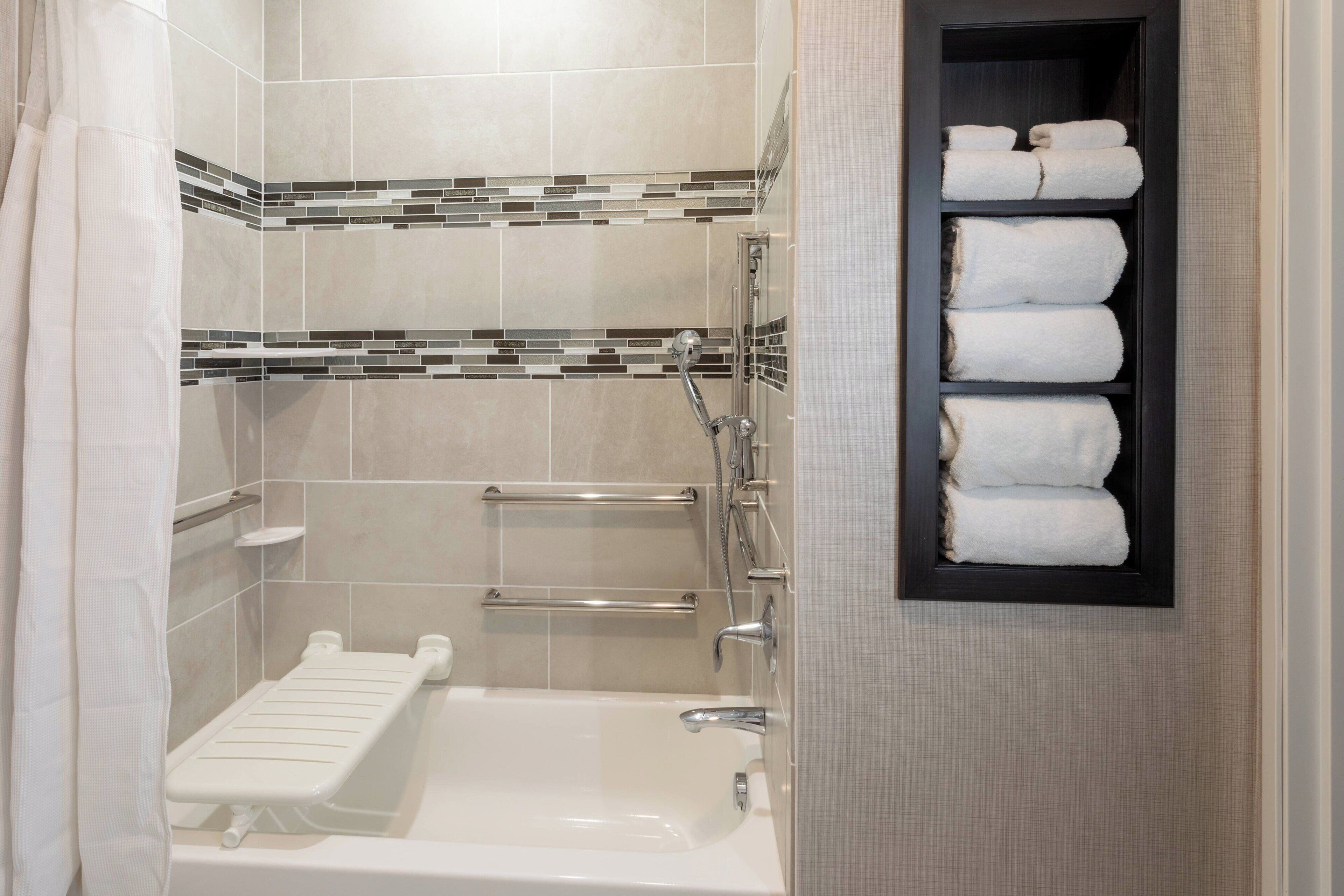 combined shower/bathtub, free toiletries, hair dryer, towels