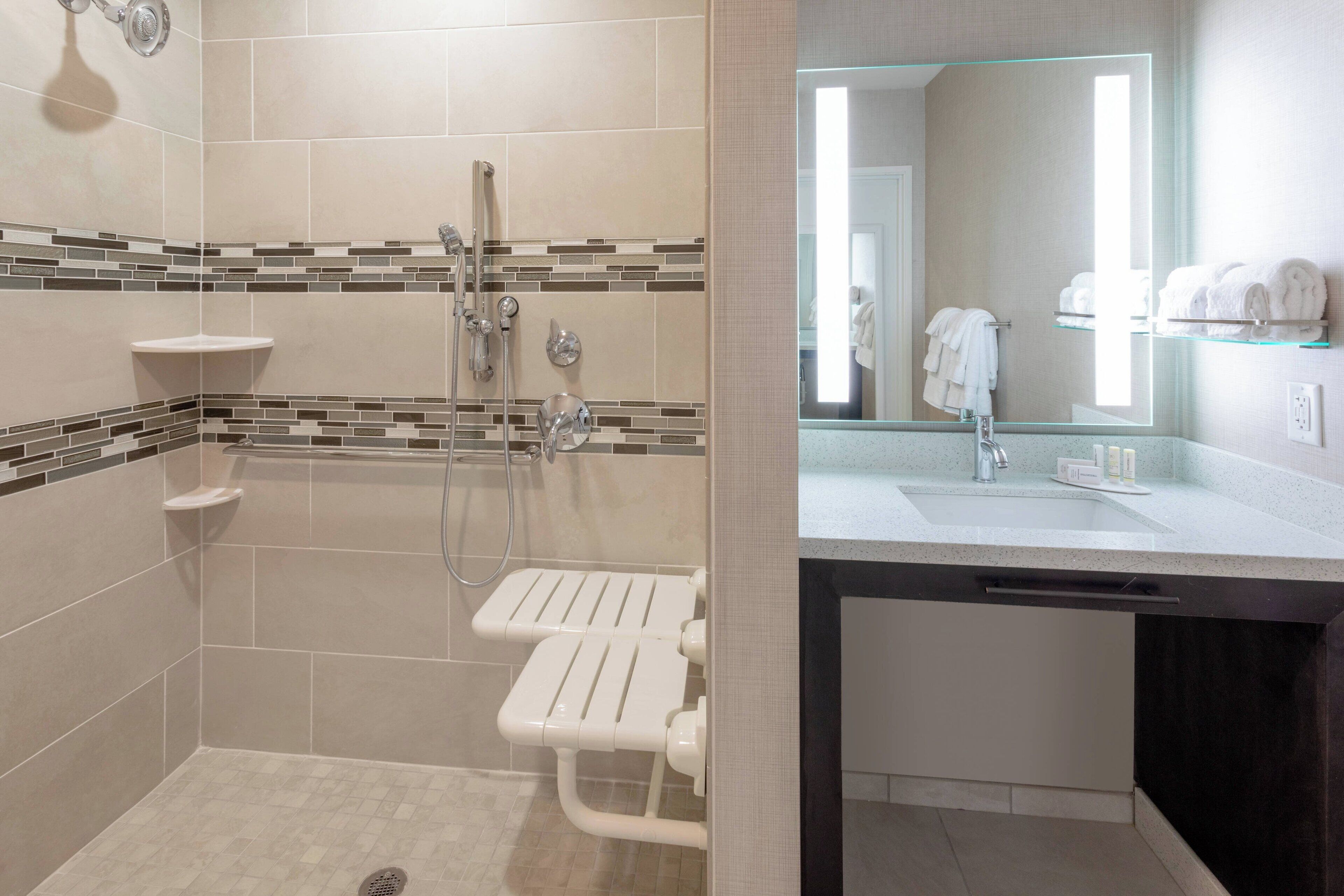 combined shower/bathtub, free toiletries, hair dryer, towels