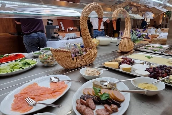 Daily buffet breakfast (EUR 12 per person)