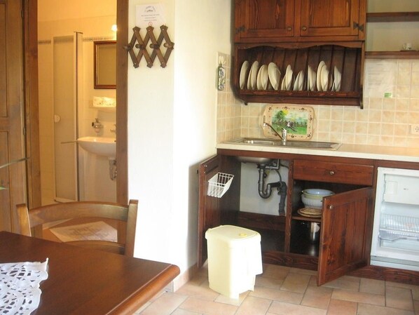 Fridge, stovetop, espresso maker, coffee/tea maker