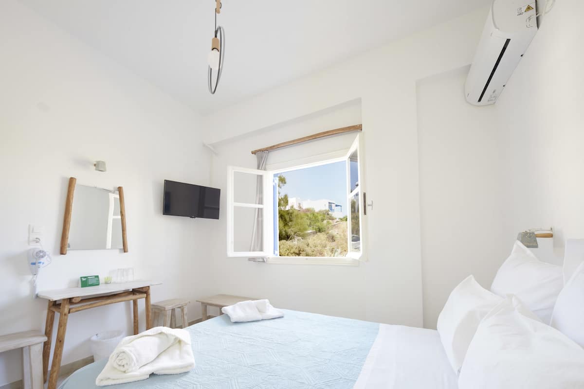 Economy Double or Twin Room (No balcony) | Minibar, desk, iron/ironing board, free WiFi