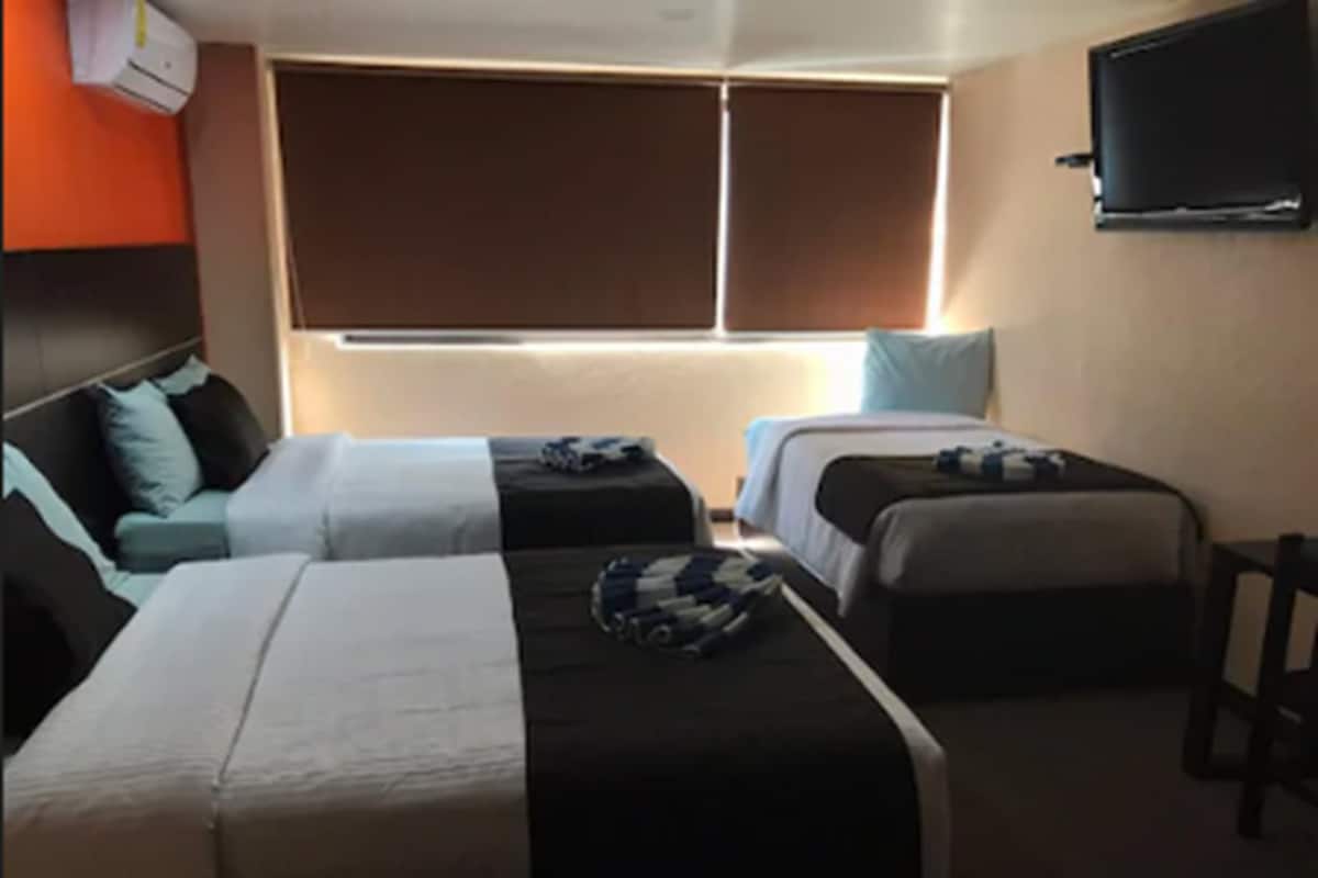 Triple Room, Multiple Beds | Desk, free WiFi, bed sheets