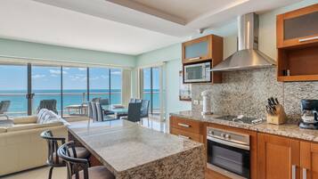 Family Condo, 2 Bedrooms, Sea View | Private kitchen | Coffee/tea maker, full-size fridge, microwave, oven