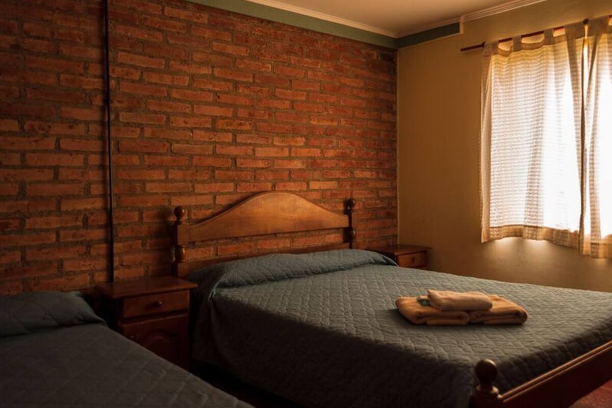 Tweepersoonskamer, 1 tweepersoonsbed, privébadkamer | 1 slaapkamer, gratis wifi, beddengoed