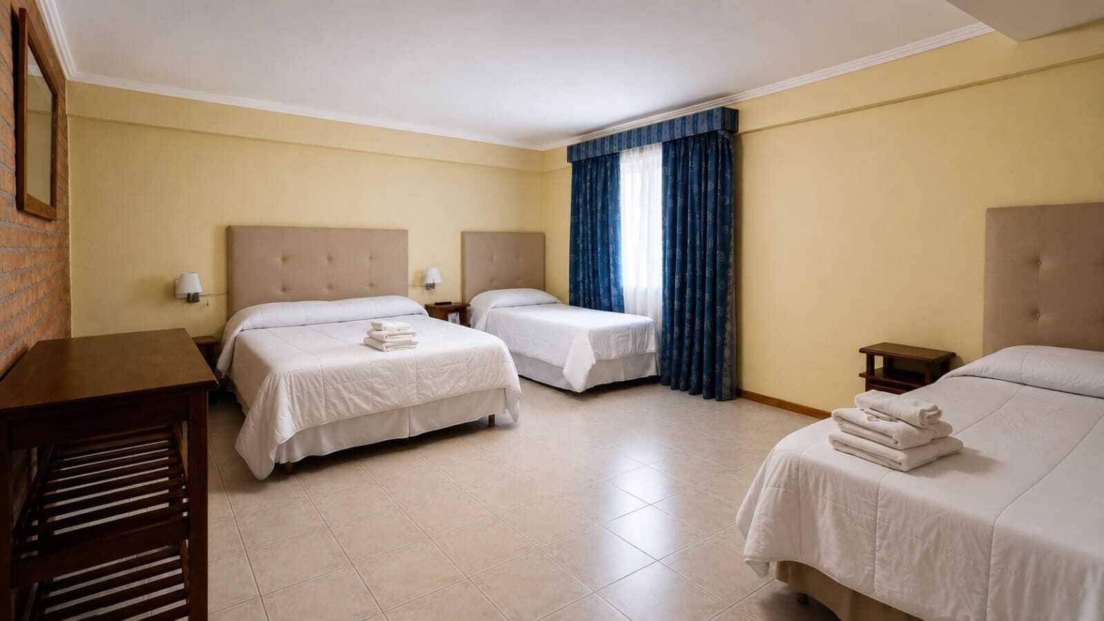 Habitación cuádruple Deluxe | Wifi gratis y ropa de cama