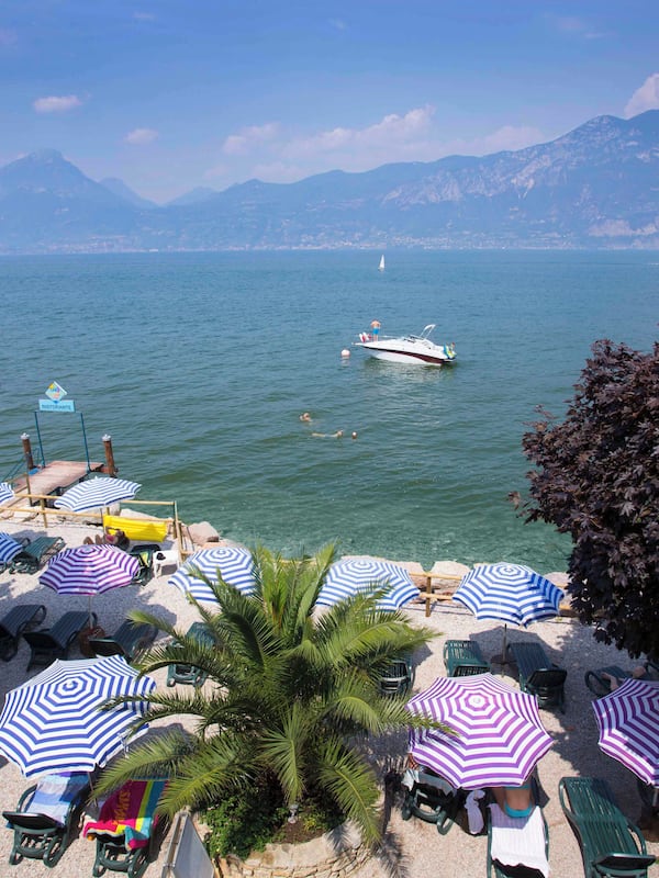 Private beach, white sand, sun loungers, beach umbrellas
