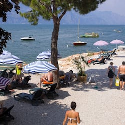 Private beach, white sand, sun loungers, beach umbrellas