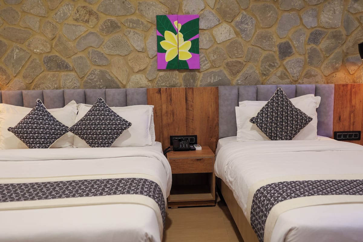 Familierom | 1 soverom, sengetøy av topp kvalitet, minibar og safe på rommet