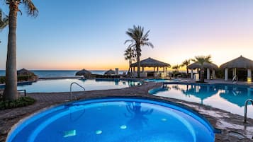 Outdoor pool, pool umbrellas, pool loungers