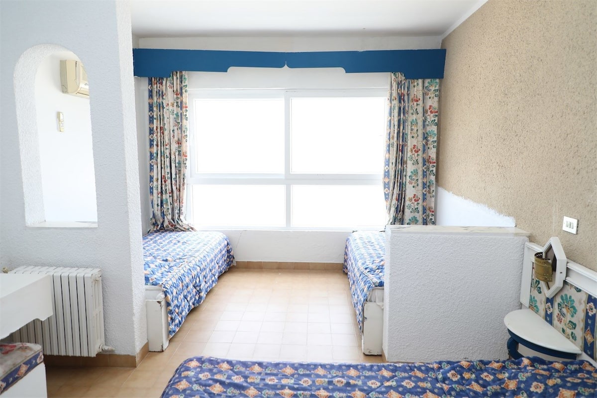 Economy Quadruple Room | Iron/ironing board, rollaway beds, bed sheets