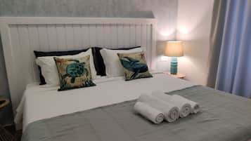 Panoramic Apartment, Private Bathroom | Living area | Flat-screen TV