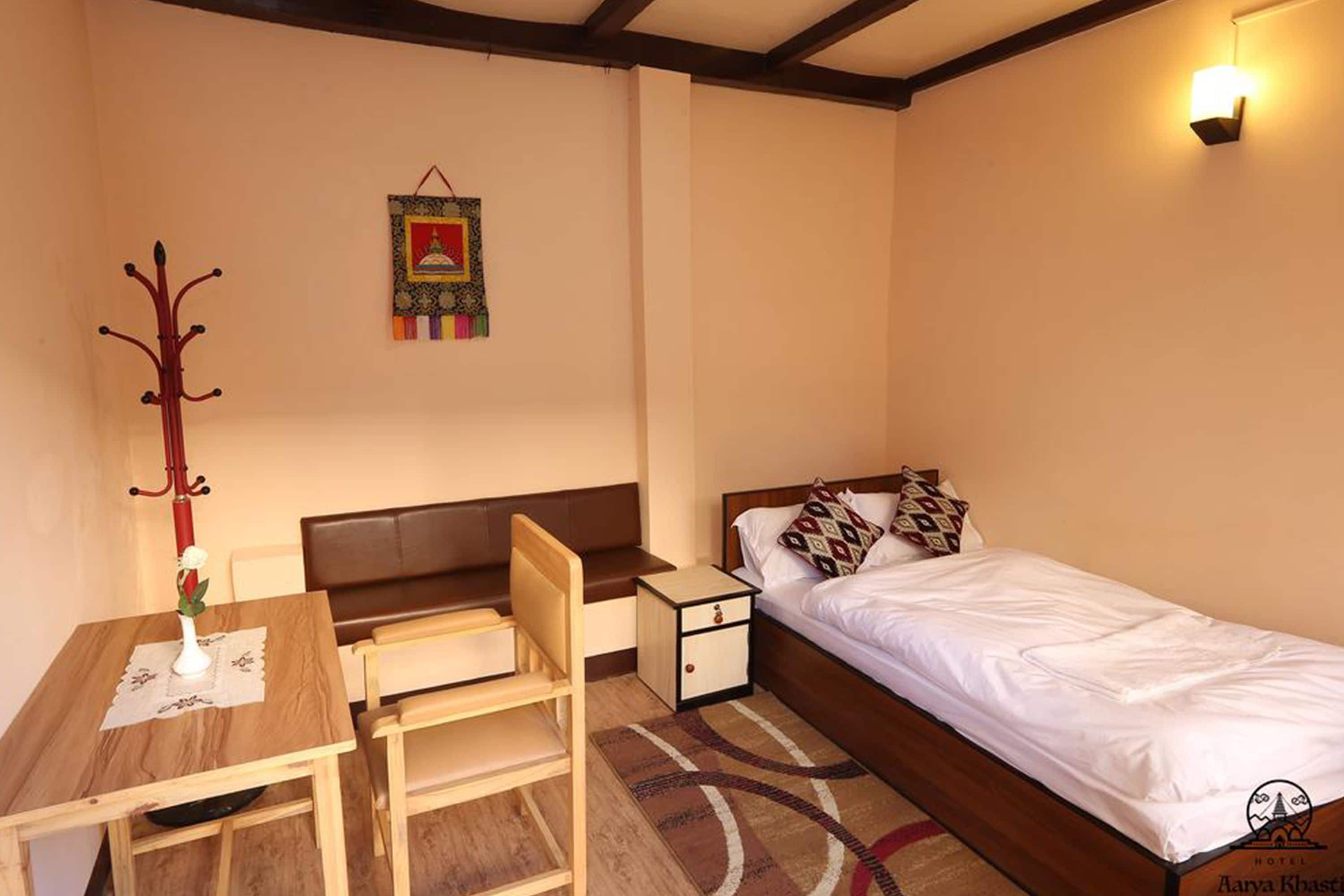 economy double room, 1 double bed, shared bathroom, garden view | desk, laptop workspace, free wifi, bed sheets