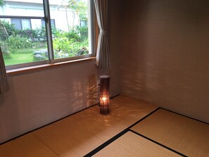 Triple Room with Garden | Down comforters, individually decorated, individually furnished, desk - Arimabaru Beach Resort (Motobu)