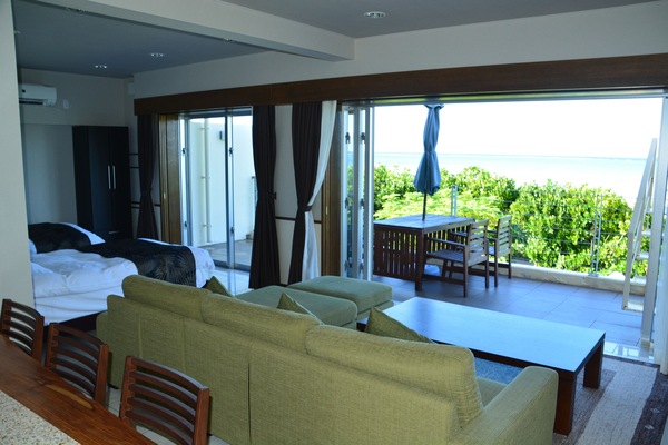 Family Room with Sea View | Living area | 50-inch flat-screen TV with cable channels