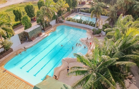 2 outdoor pools, open 7 AM to 6:00 PM, pool umbrellas, sun loungers. Nature's Village Resort