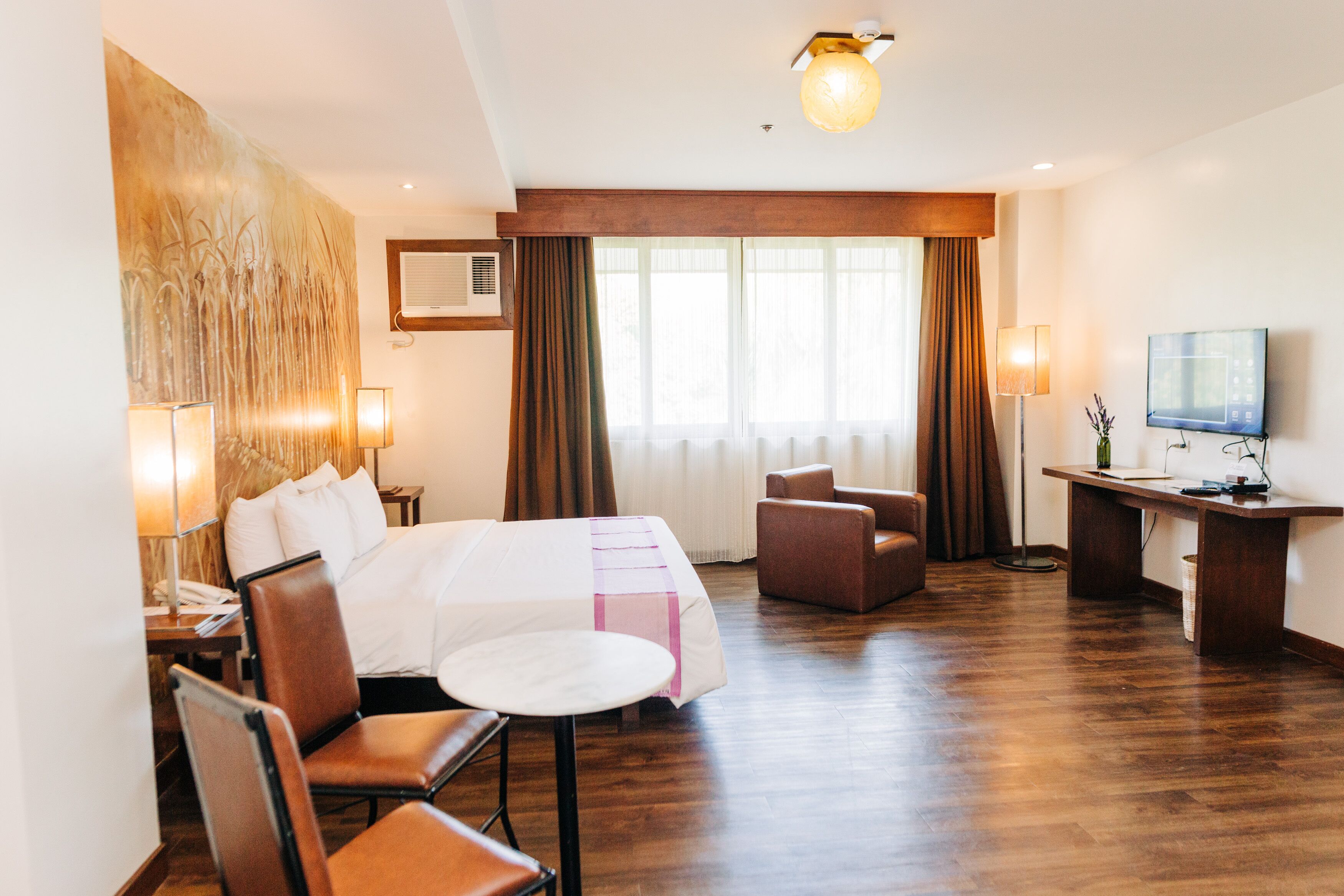 deluxe room | in-room safe, desk, blackout curtains, iron/ironing board