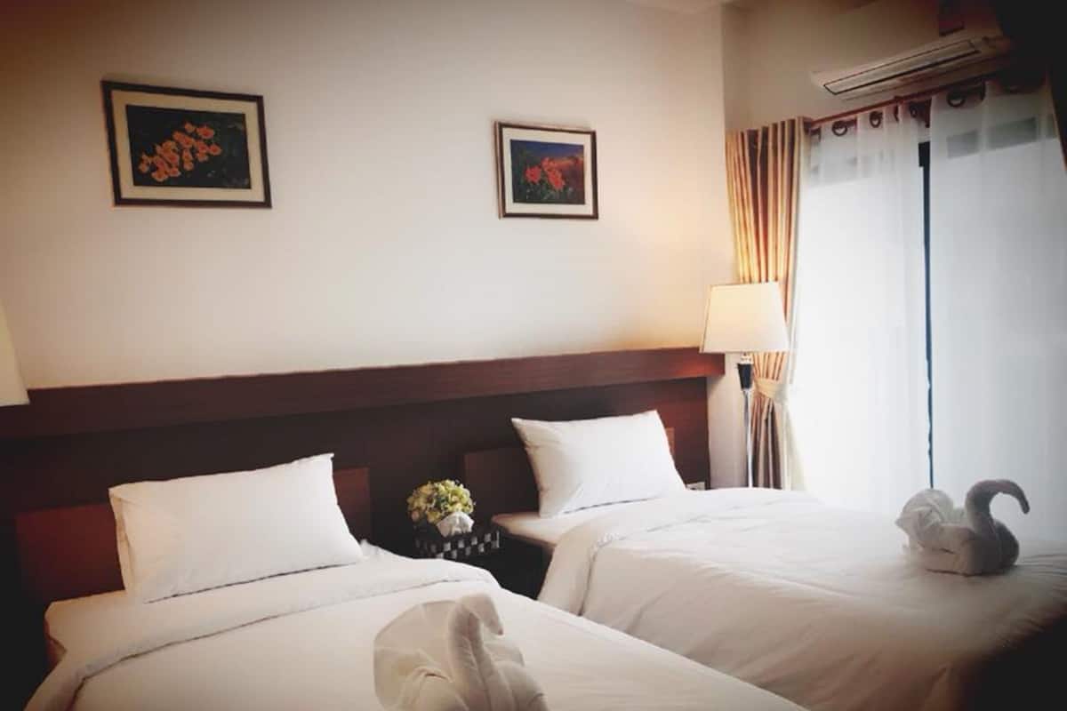 Standard Twin Room | Individually decorated, blackout drapes, rollaway beds, free WiFi