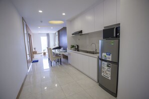 Apartment, 1 Bedroom, City View | Desk, soundproofing, iron/ironing board, free WiFi