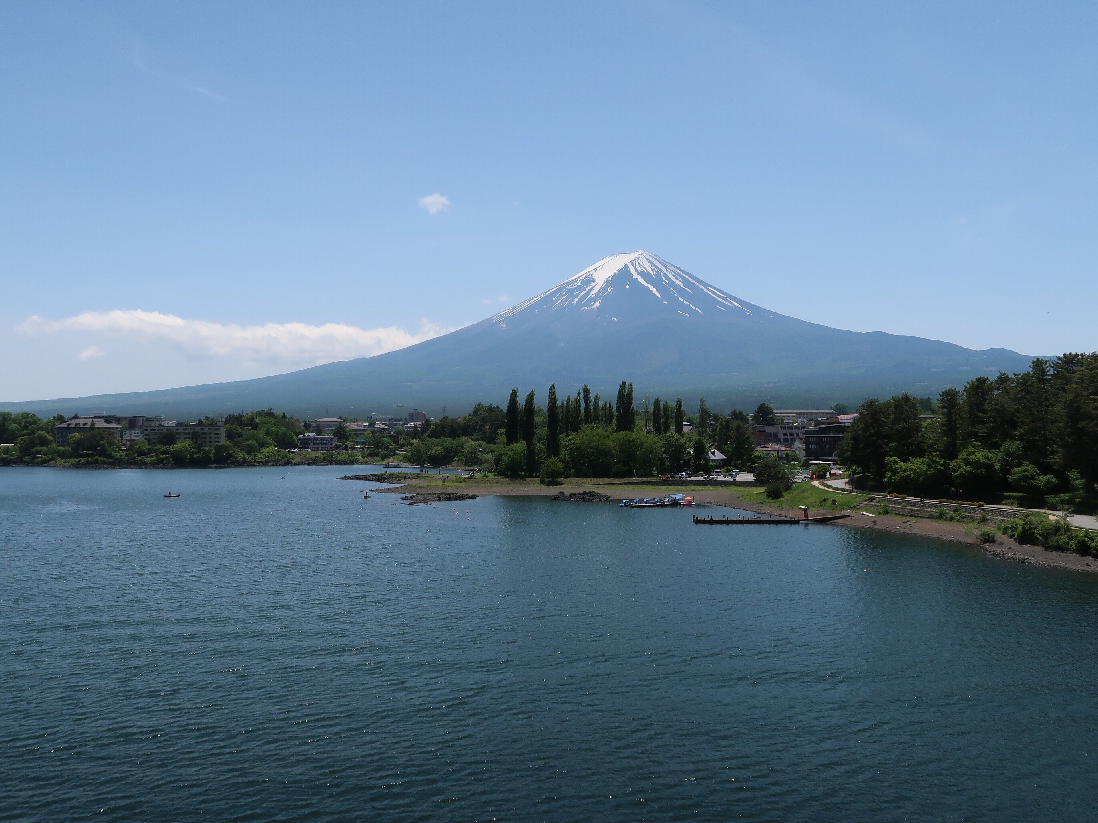 A lake with a mountain in the background.