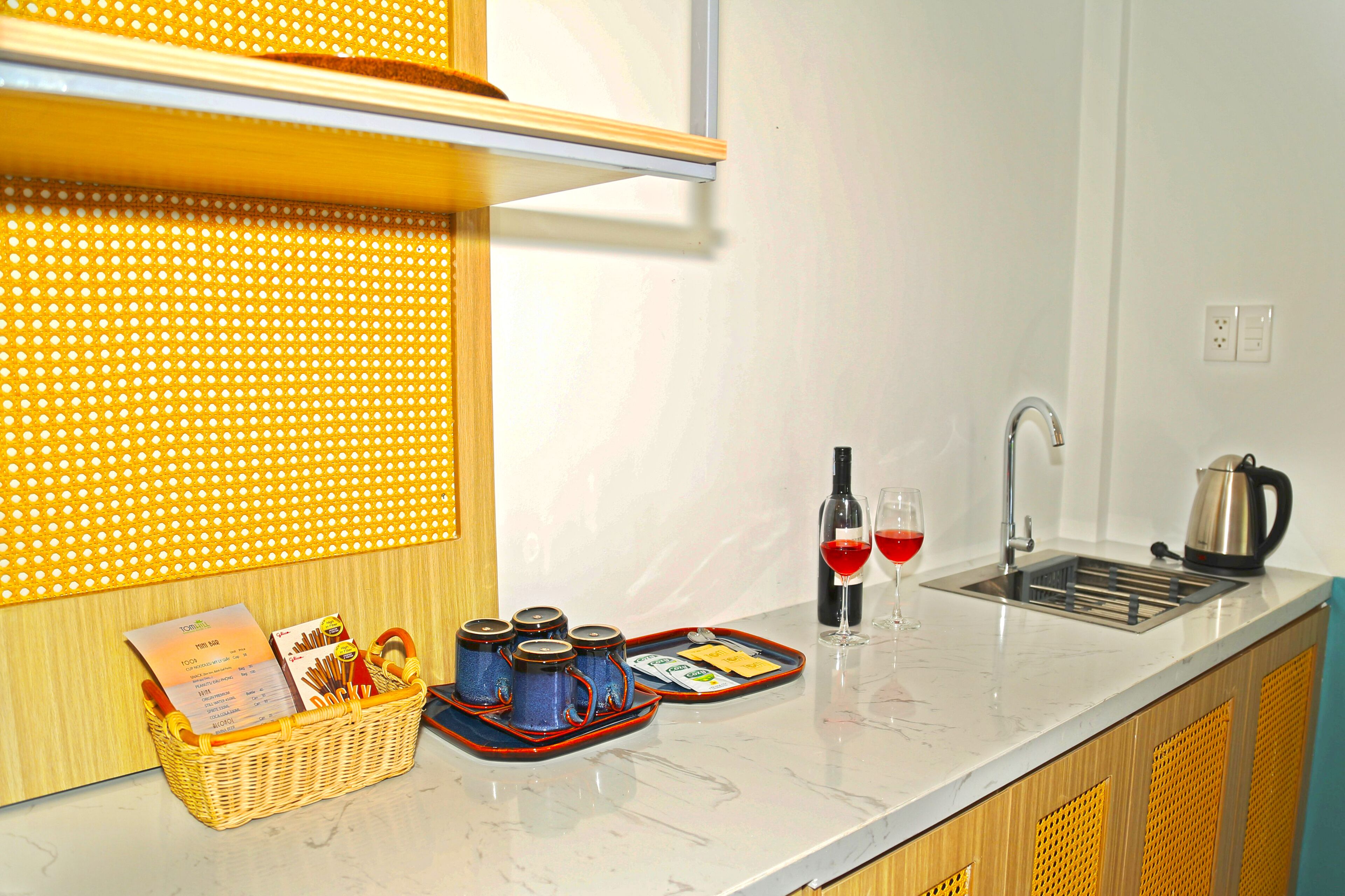 sunny villa garden view with bathtub | private kitchen | mini-fridge, cleaning supplies, paper towels