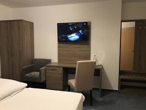 Eenpersoonskamer | Een kluis op de kamer, een bureau, gratis wifi, beddengoed