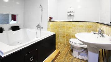 Standard Double Room, Jetted Tub | Bathroom | Free toiletries, hair dryer, towels