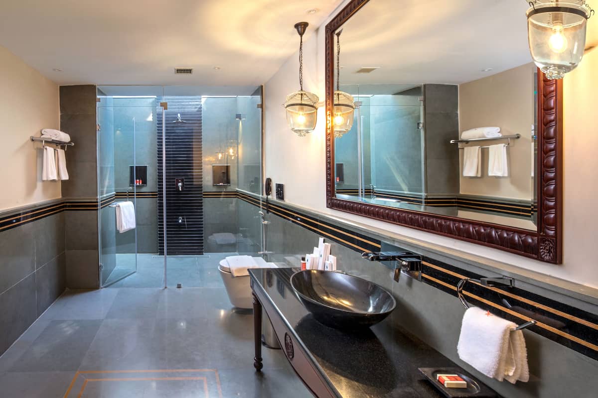 luxury room, private pool, garden view | bathroom | designer toiletries, hair dryer, bathrobes, slippers