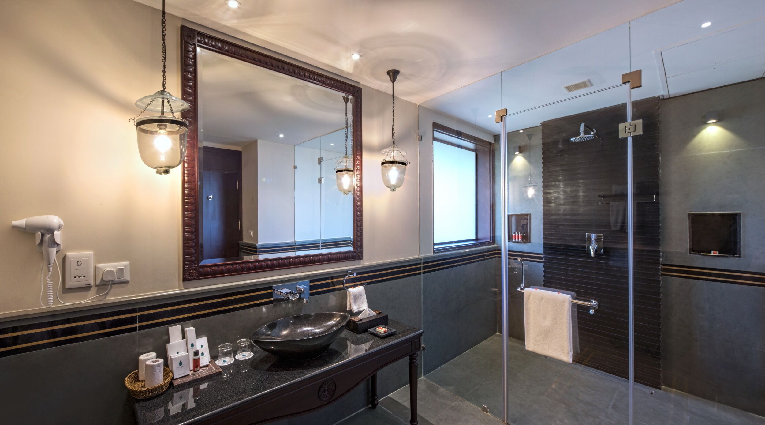 superior villa, lake view | bathroom | designer toiletries, hair dryer, bathrobes, slippers