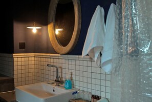 Shower, free toiletries, hair dryer, slippers