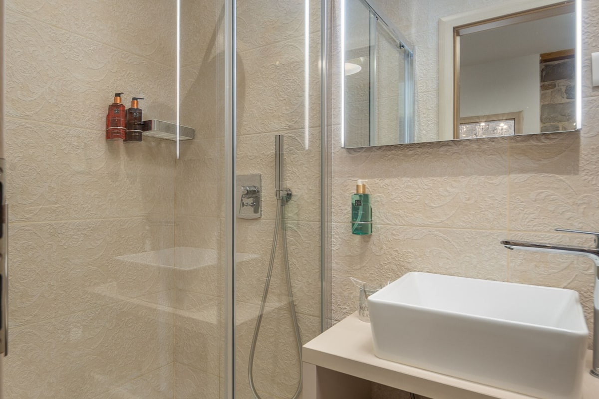 shower, free toiletries, hair dryer, bathrobes