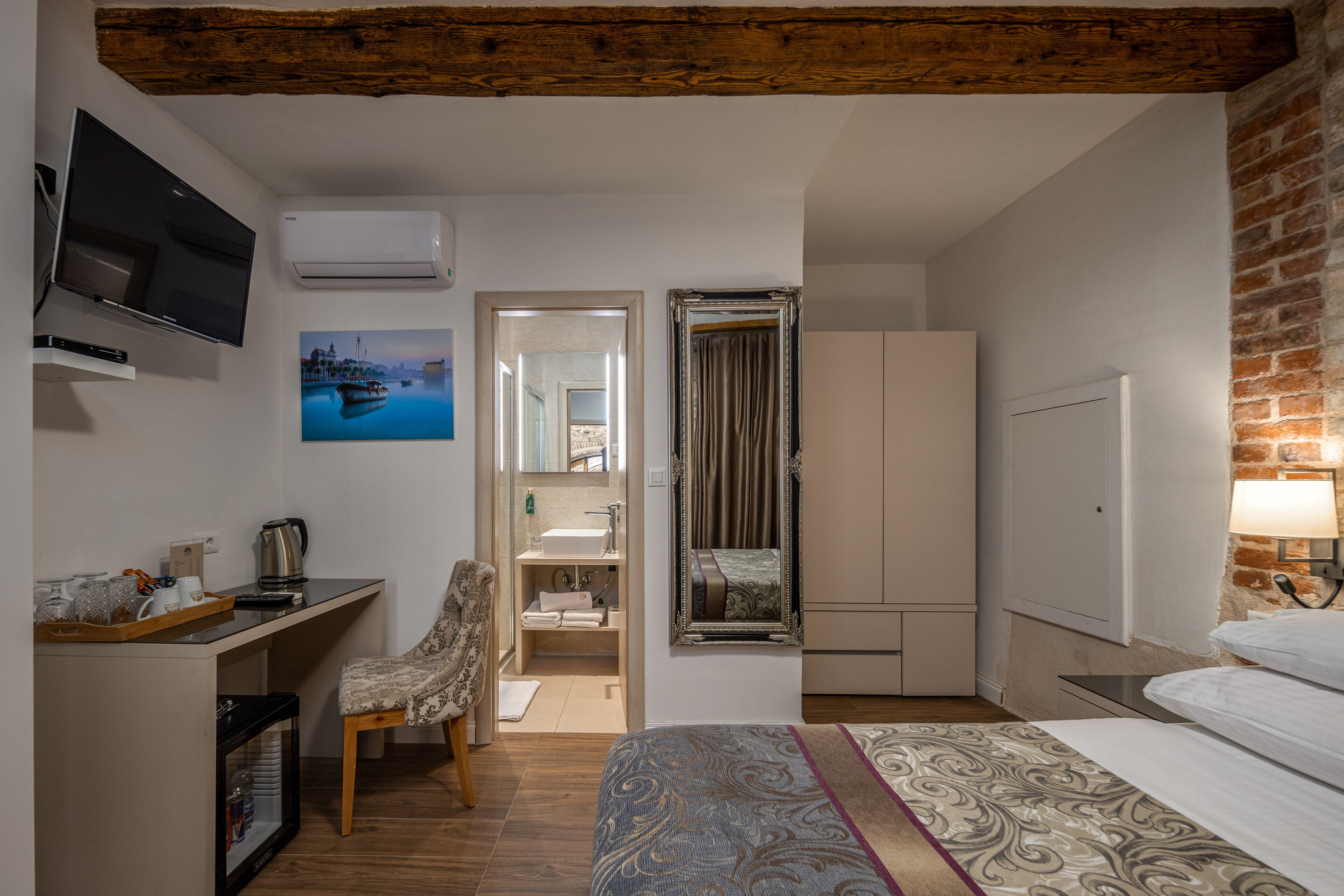 economy double room | premium bedding, down duvets, memory-foam beds, minibar