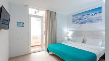 Premium bedding, down duvets, in-room safe, desk