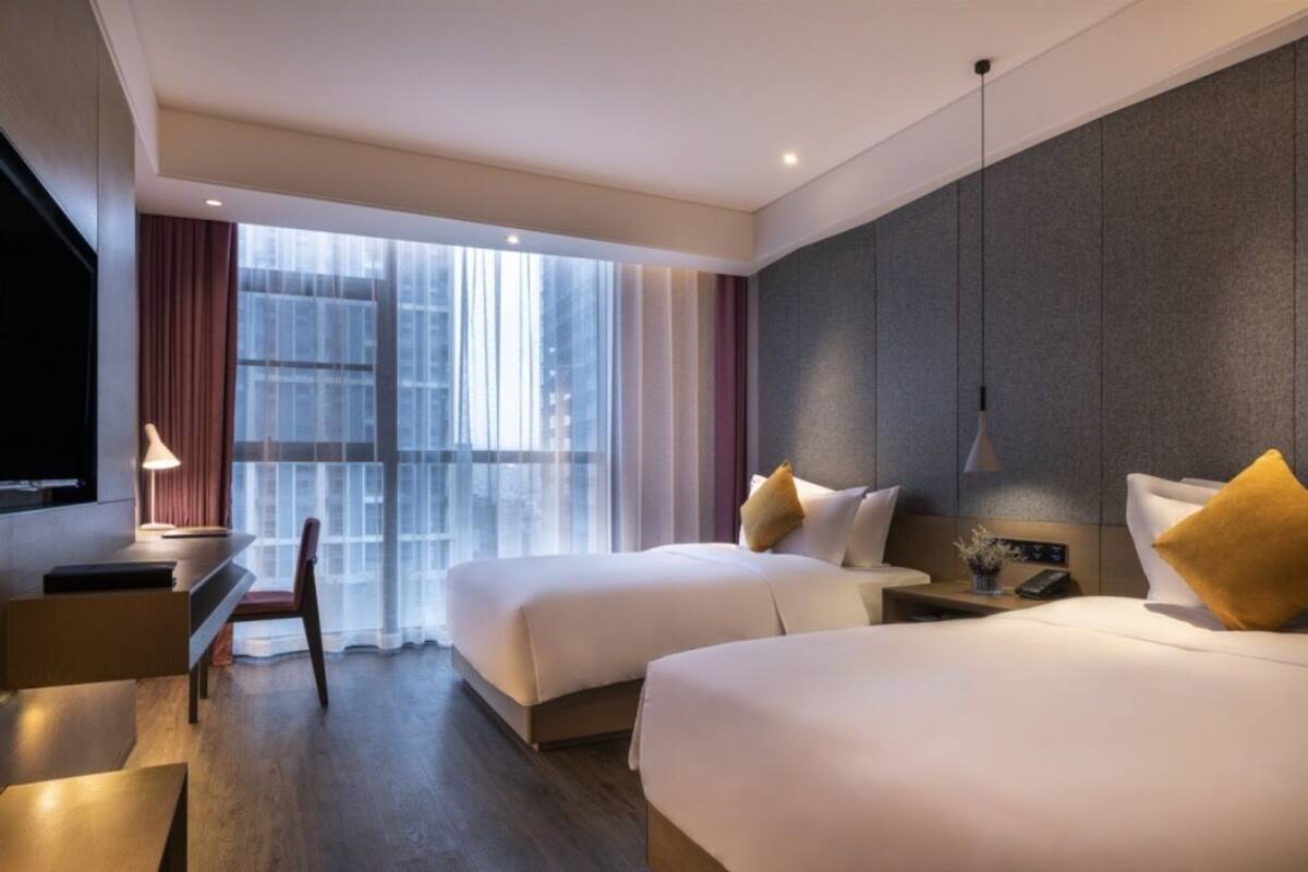 Deluxe Room, 2 Single Beds | Minibar, in-room safe, individually furnished, desk