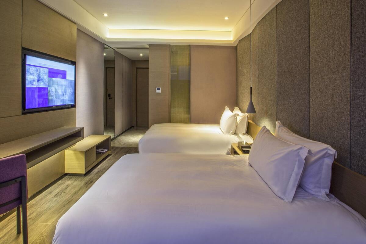 Chambre Standard, 2 lits une place | Minibar, coffres-forts dans les chambres, ameublement personnalisé