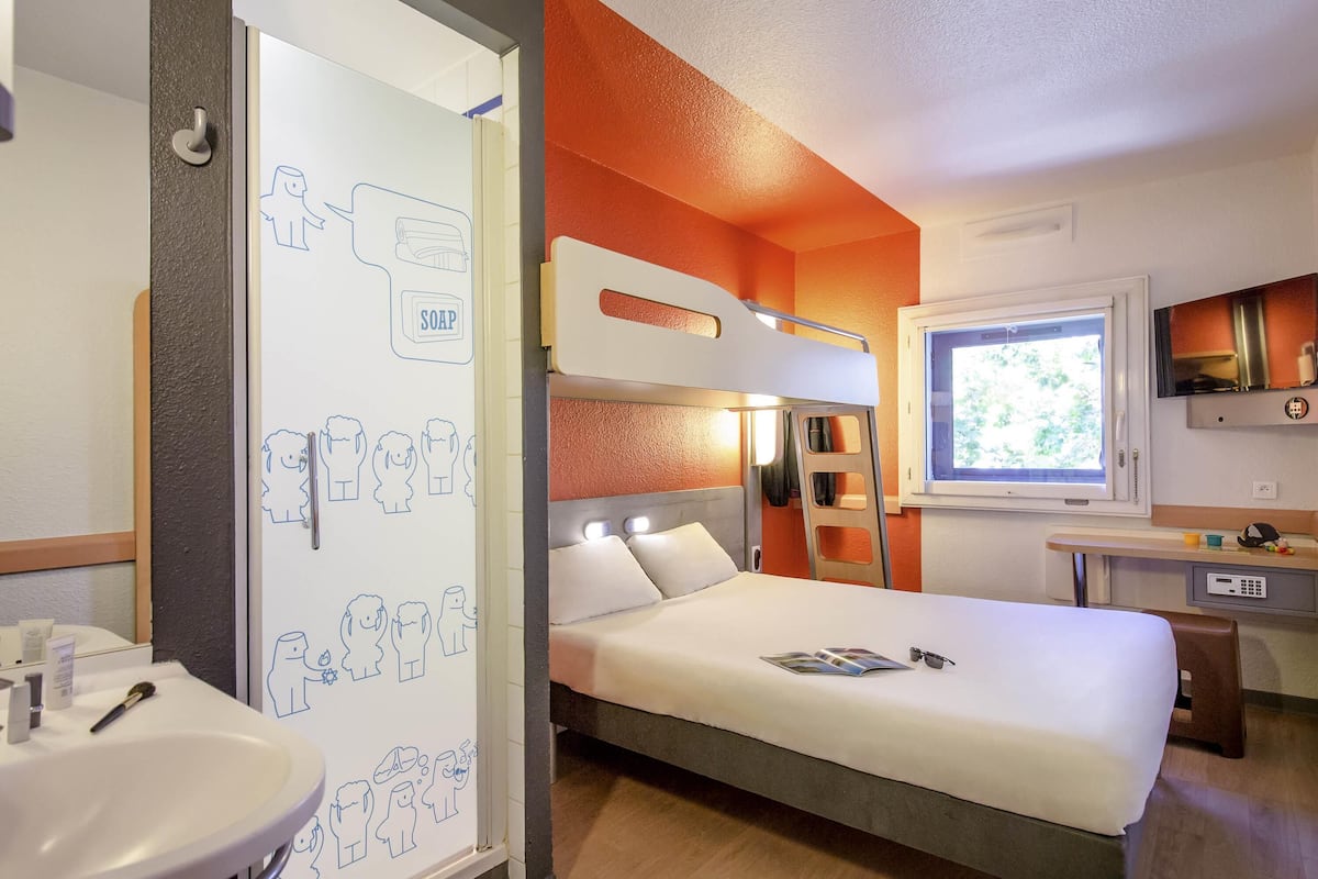 Premium bedding, memory-foam beds, in-room safe, desk