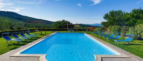 Outdoor pool, open 10 AM to 7 PM, sun loungers