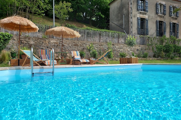 Seasonal outdoor pool, open 11:00 AM to 8 PM, pool umbrellas