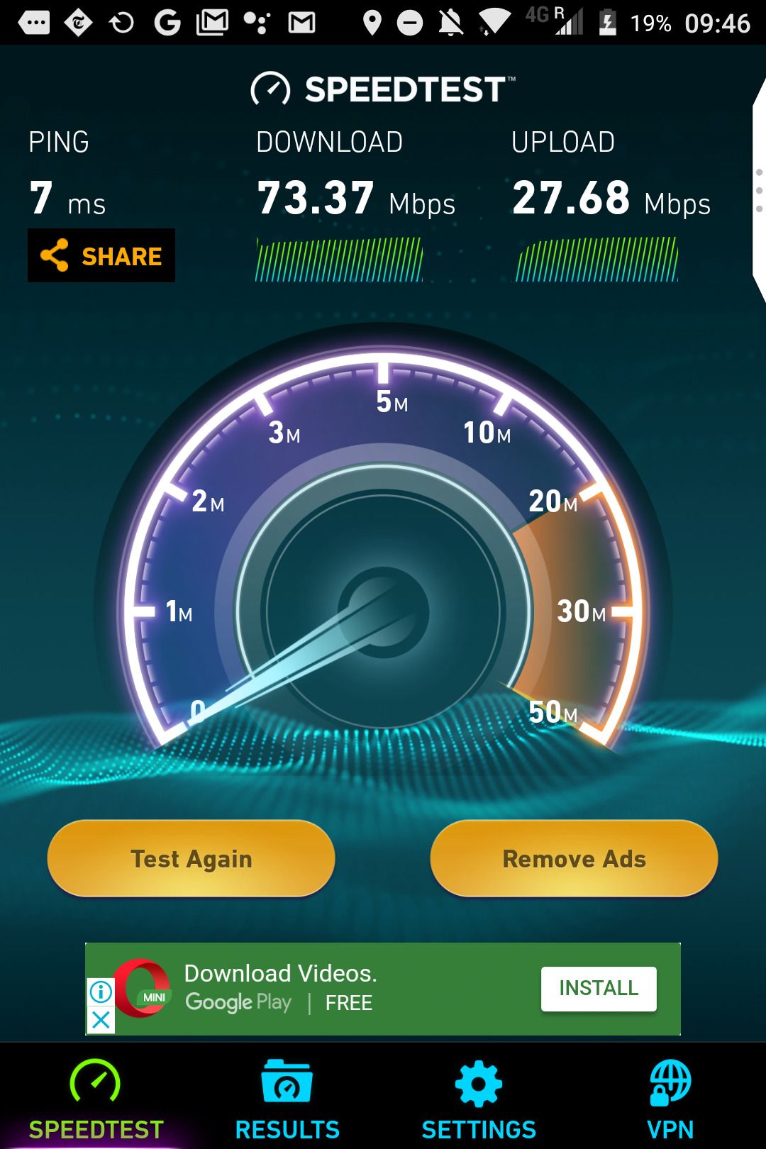 A speed test application interface with a gauge indicating download and upload speeds.