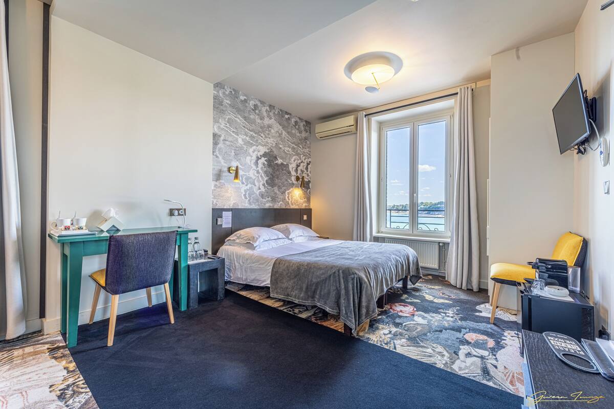 Family Double Room, Beach View | Minibar (free items), in-room safe, desk, laptop workspace
