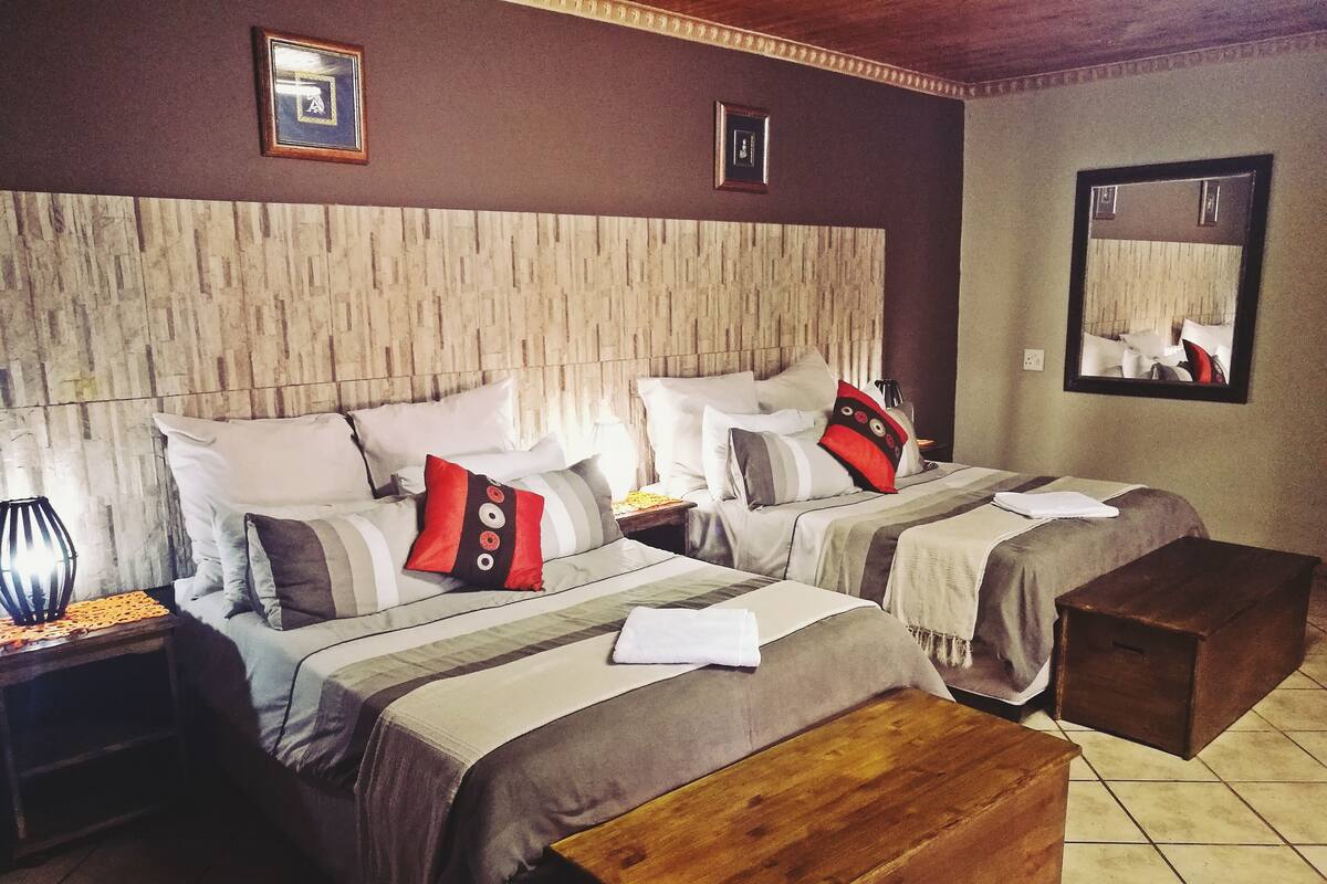 Executive Quadruple Room, Patio | Desk, bed sheets