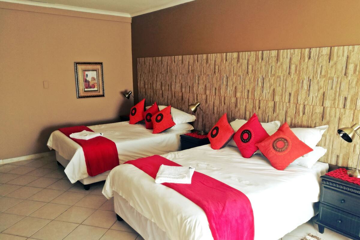 Executive Quadruple Room, Kitchen | Desk, bed sheets