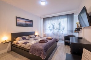 1 bedroom, premium bedding, iron/ironing board, bed sheets