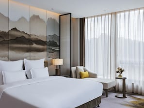 Suite Deluxe, 1 llit de matrimoni gran, accés a la sala del club | 1 dormitori, minibar, caixa forta a l'habitació i decoració individual