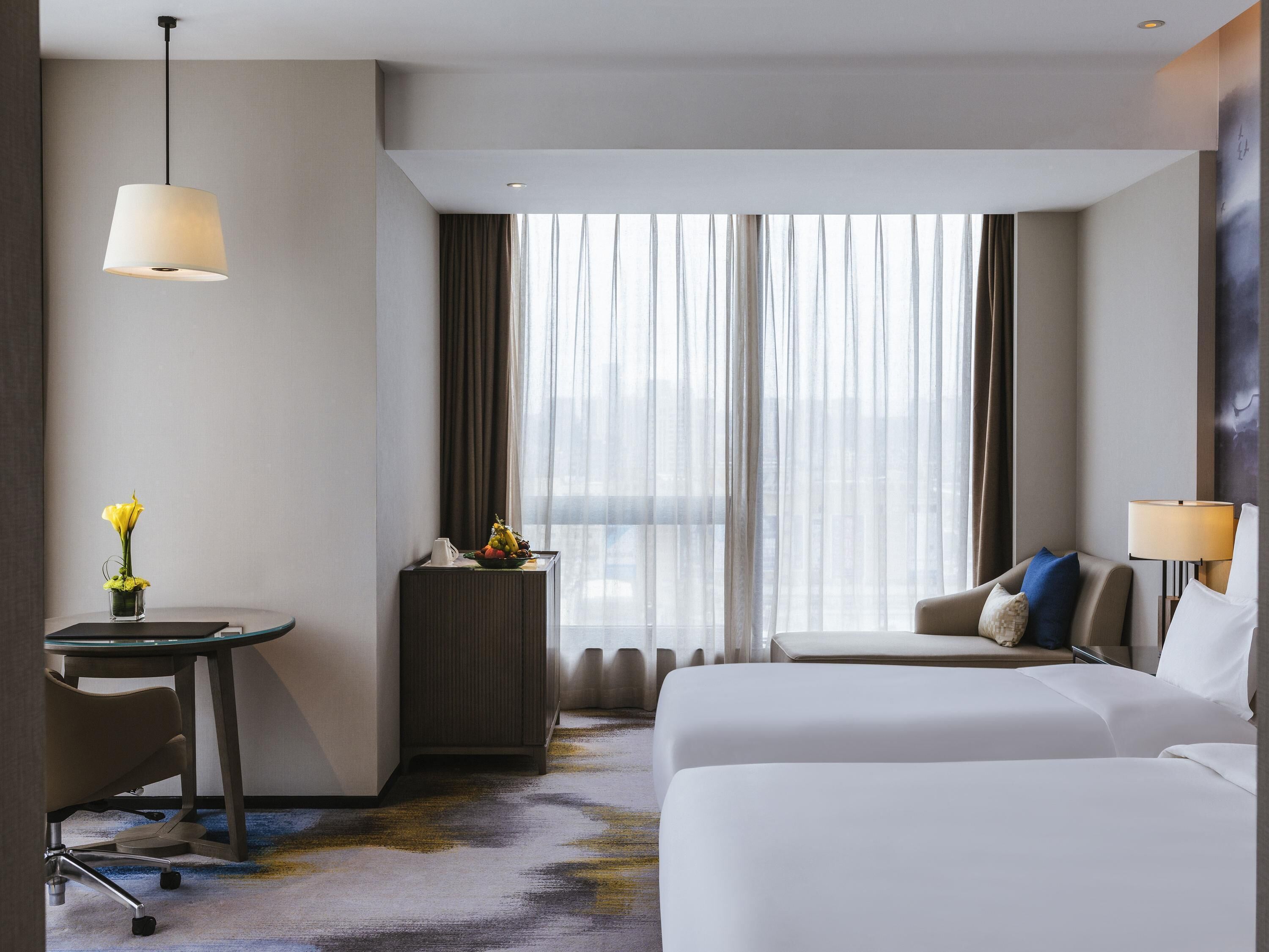 Deluxe Room, Multiple Beds, City View (Premium) | 1 bedroom, minibar, in-room safe, individually decorated